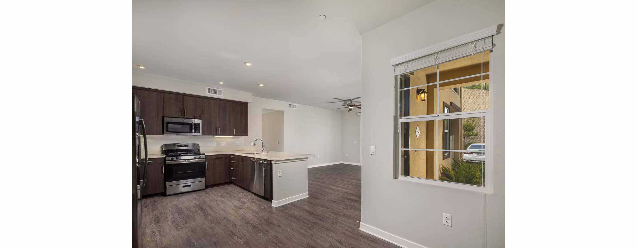 Cozy dining area with modern chandelier in Lakeview 88 Apartments