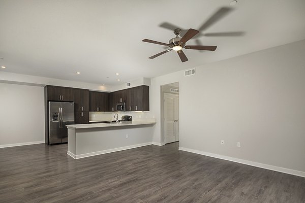 Modern kitchen with stainless steel appliances in Lakeview 88 Apartments