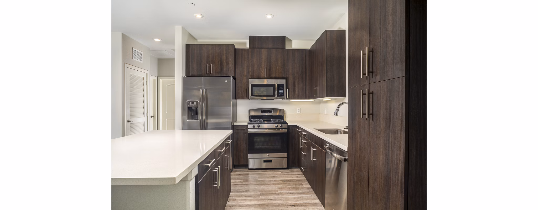 Modern kitchen with stainless steel appliances at Lakeview 88 Apartments