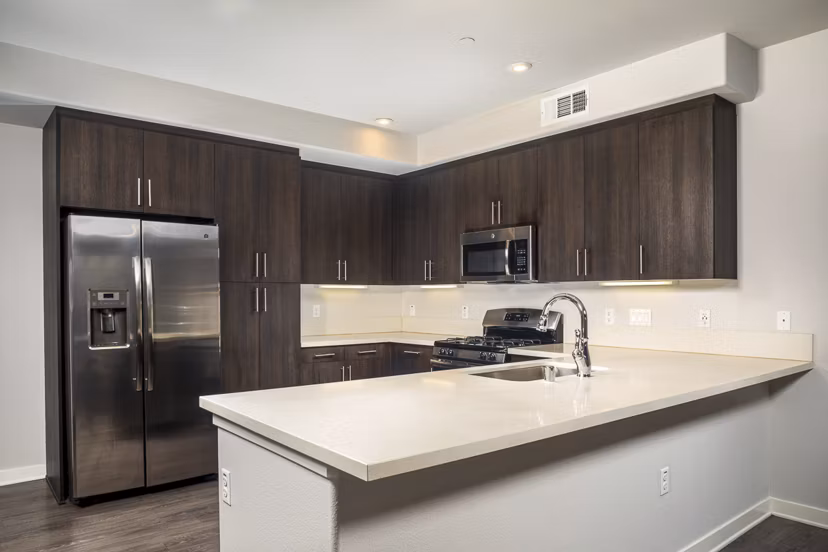 Modern kitchen with stainless steel appliances at Lakeview 88 Apartments