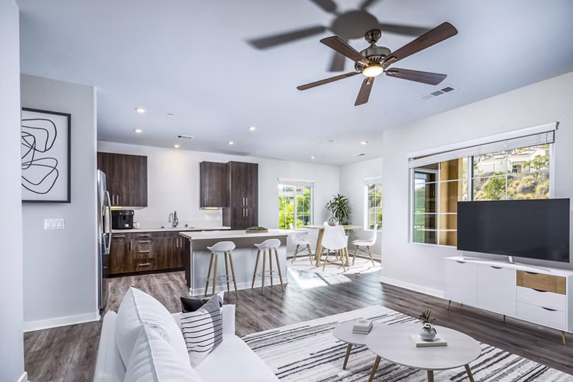 Spacious living room with modern furnishings and natural light in Lakeview 88 Apartments