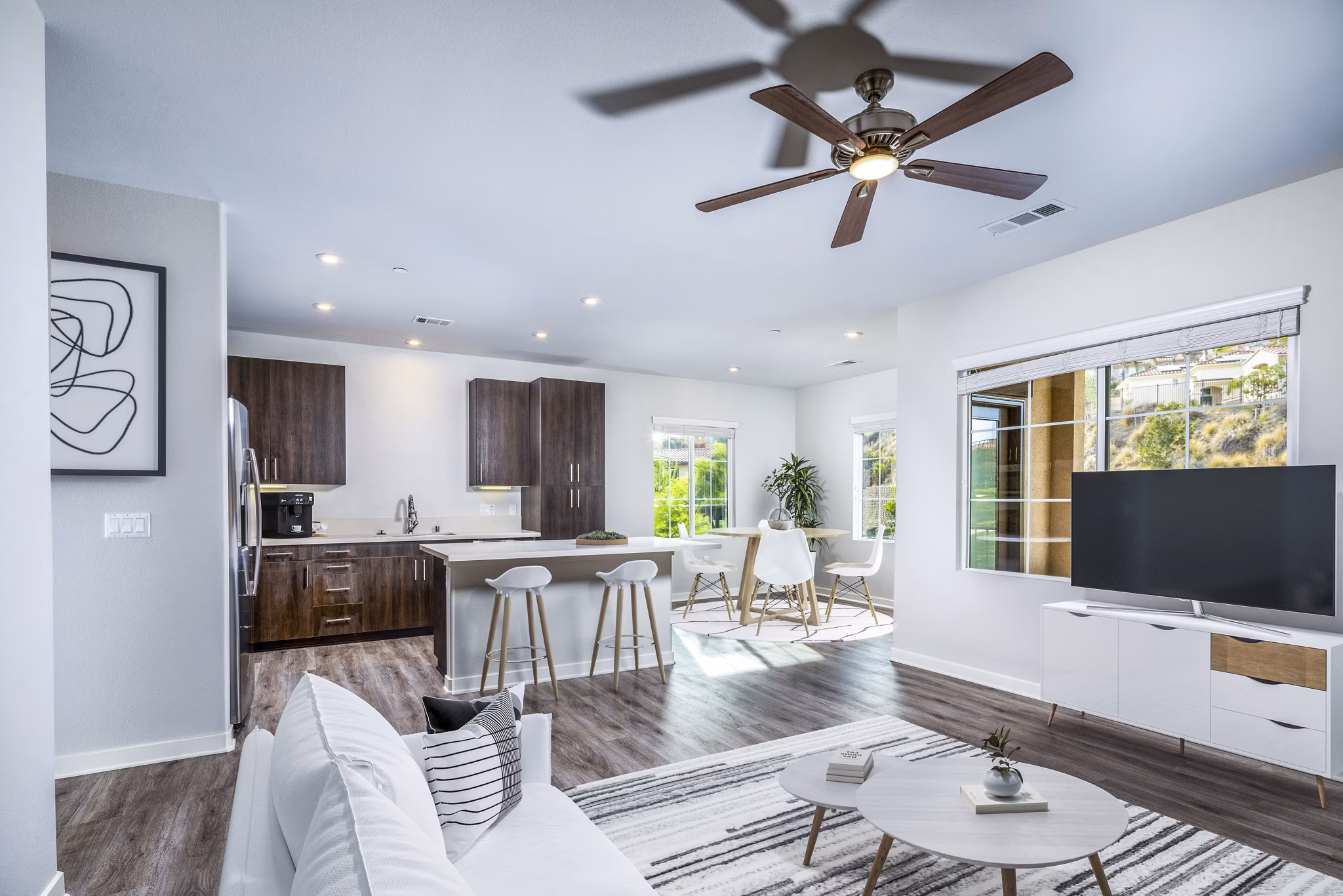 Spacious living room with modern furnishings and natural light in Lakeview 88 Apartments