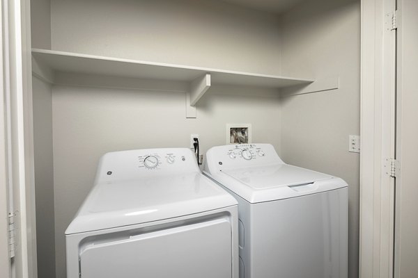 Laundry room featuring energy-efficient washers and dryers at Lakeview 88 Apartments