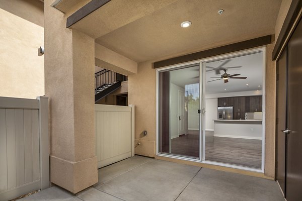 Spacious outdoor patio with modern seating at Lakeview 88 Apartments, perfect for relaxation and entertaining guests