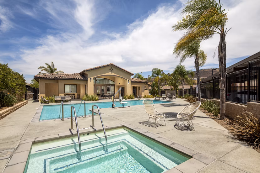 Resort-style pool with lounge chairs at Lakeview 88 Apartments, perfect for relaxation in luxury surroundings