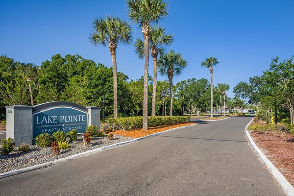 Entrance signage at Lake Pointe Apartments, luxury living community with modern amenities
