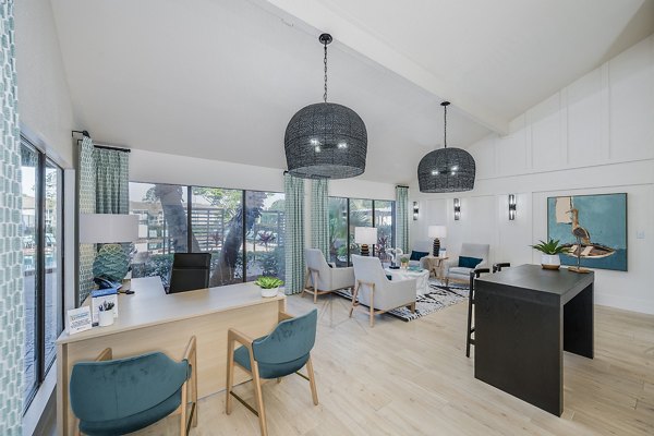 Clubhouse with modern furnishings and cozy seating areas at Lake Pointe Apartments