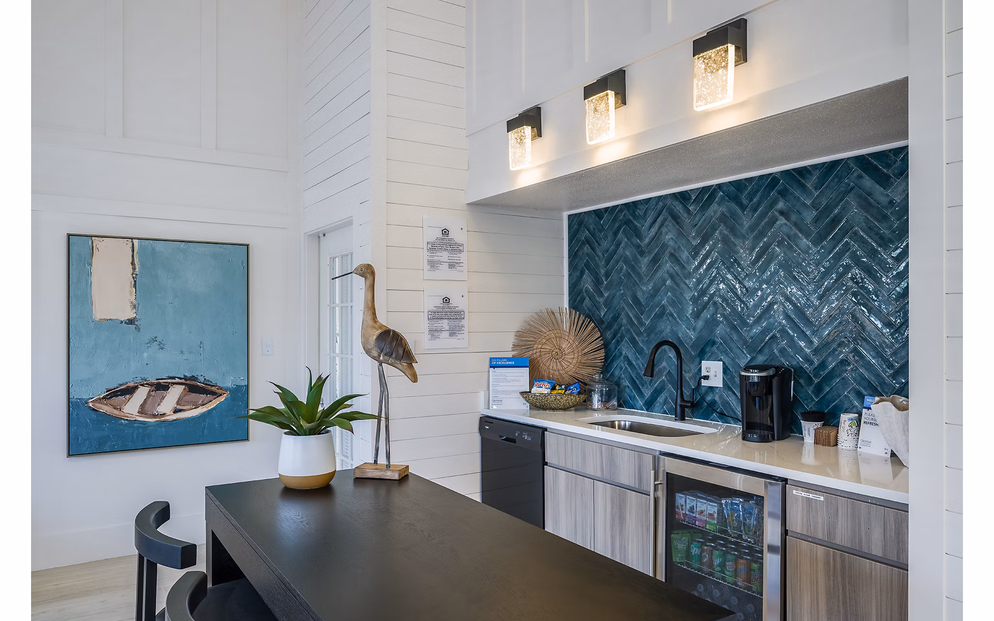 Clubhouse featuring modern design and cozy seating at Lake Pointe Apartments