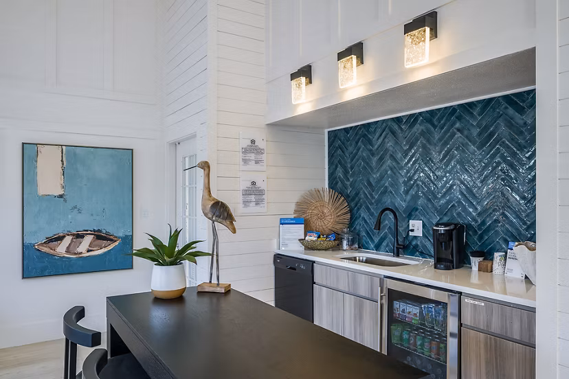 Clubhouse featuring modern design and cozy seating at Lake Pointe Apartments