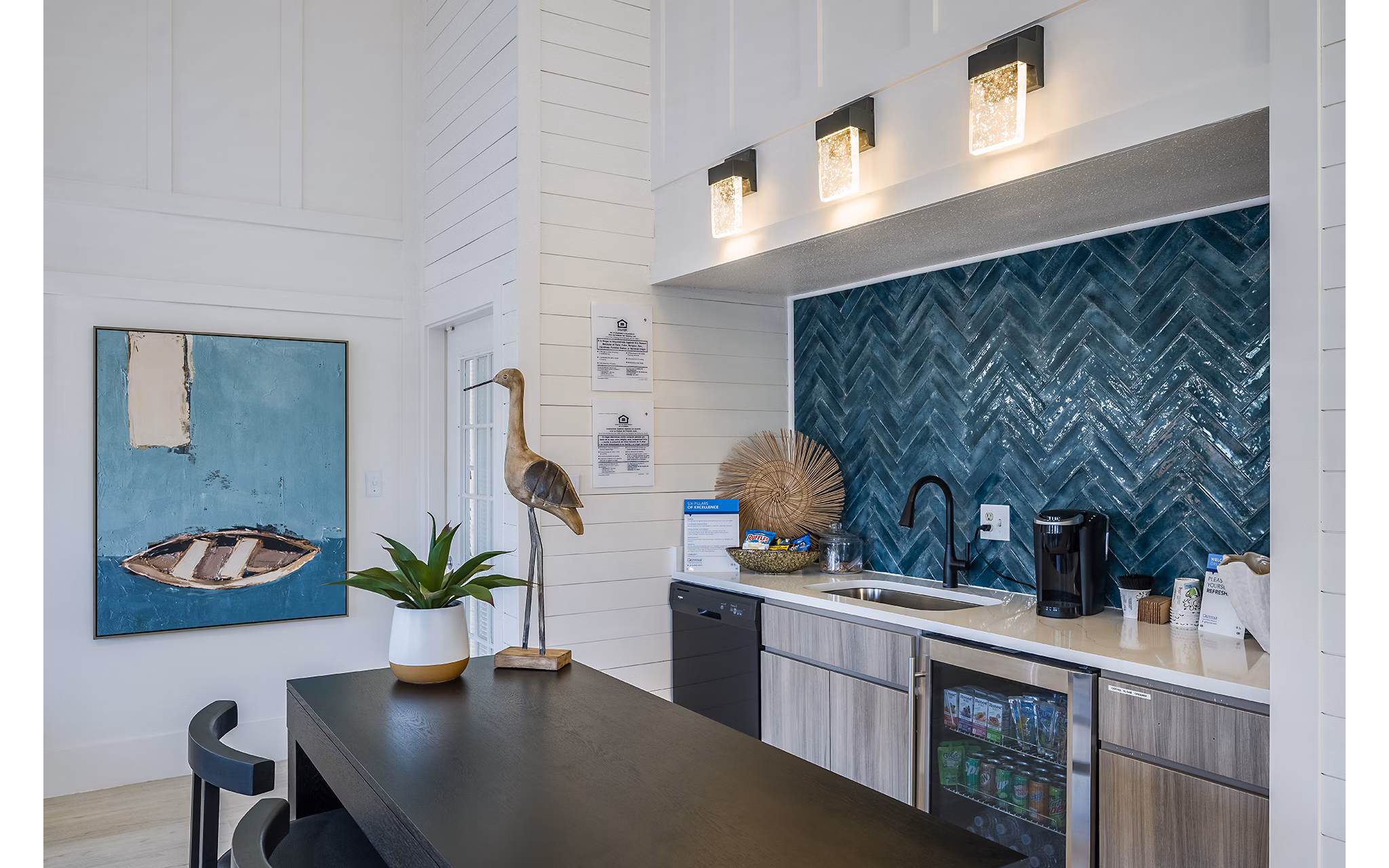 Clubhouse featuring modern design and cozy seating at Lake Pointe Apartments