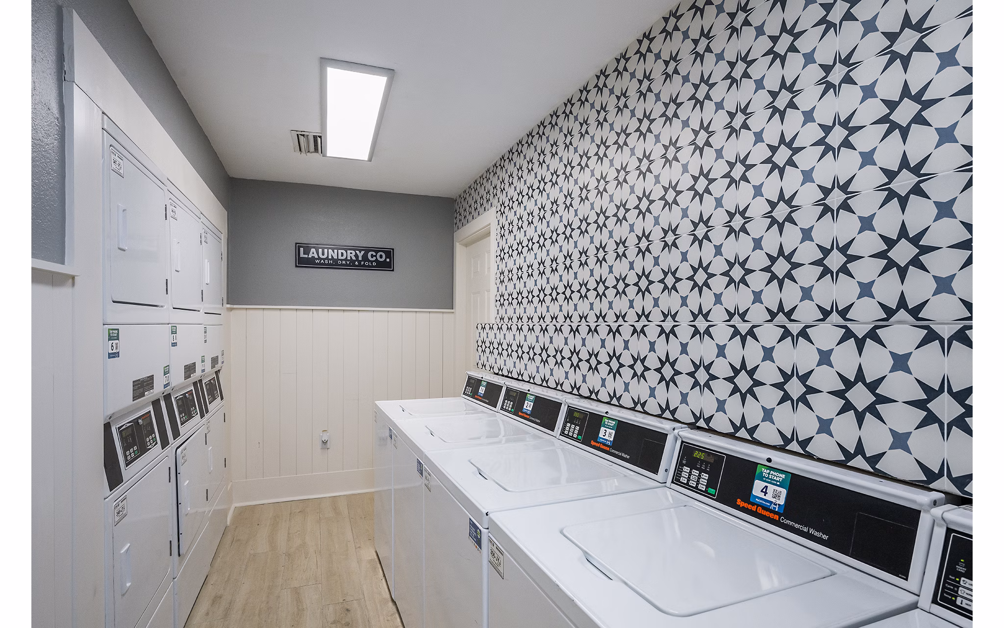 Efficient laundry facility at Lake Pointe Apartments with modern washers and dryers, ensuring convenience for residents