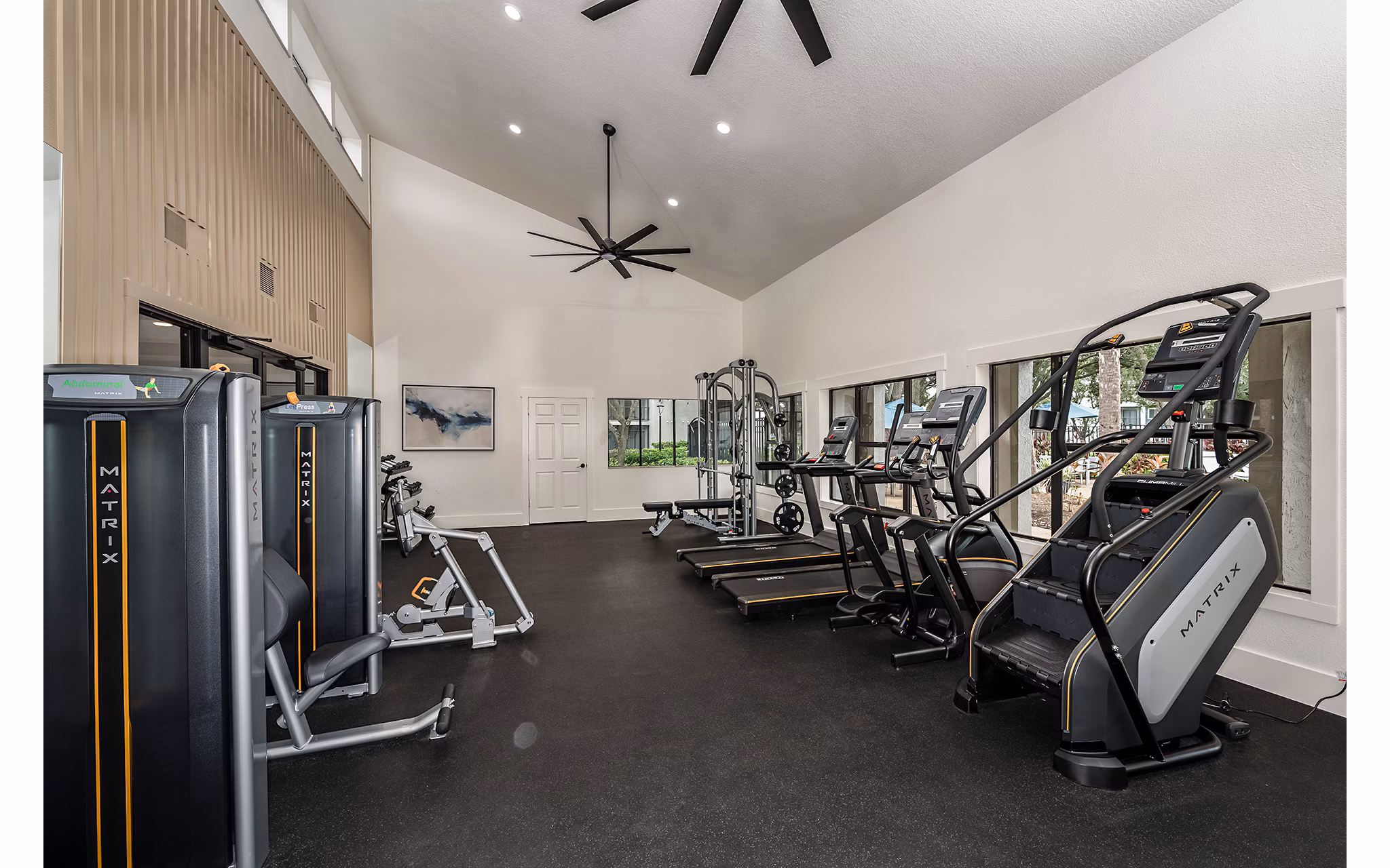 fitness center at Cadia on the Loop Apartments 