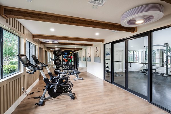 fitness center at Cadia on the Loop Apartments 