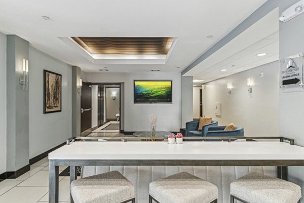 Modern clubhouse featuring stylish seating and entertainment options at Rivers Edge Apartments