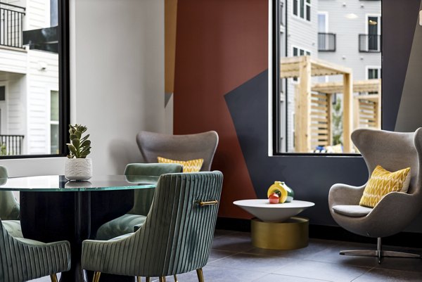 Clubhouse featuring modern decor and social spaces at Broadstone Oak City Apartments, a Greystar luxury property