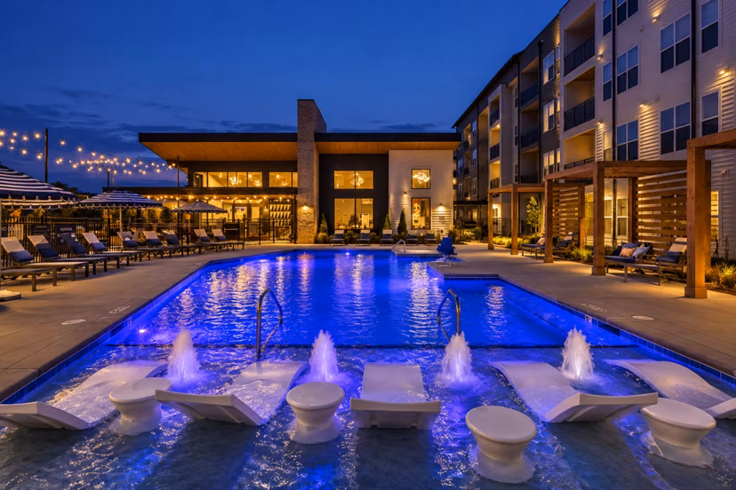 Resort-style pool area at Broadstone Oak City Apartments offering luxury amenities for relaxation in a serene environment