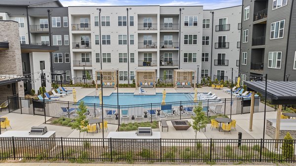 Resort-style pool area at Broadstone Oak City Apartments offering luxury amenities for relaxation in a serene environment