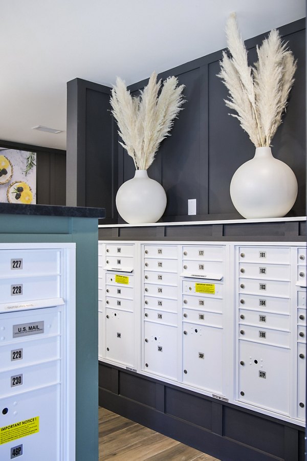 Mail room with modern design at Novel Cary Apartments, a premier location for luxury living prepared to meet your package delivery needs