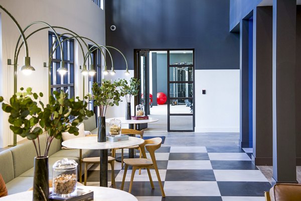 Elegant clubhouse lobby with modern decor at Novel Cary Apartments