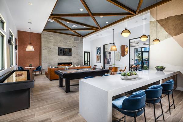 clubhouse game room at The Hawthorne Apartments
