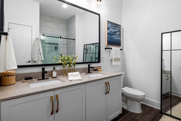 Bathroom with contemporary design and elegant fixtures in The Pace at Holding Village Apartments
