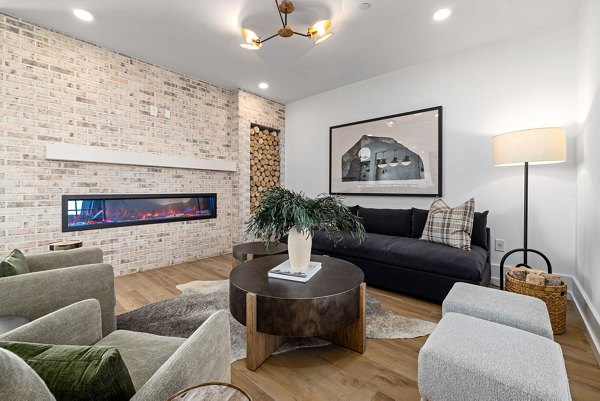 Clubhouse featuring modern design and social spaces at The Pace at Holding Village Apartments