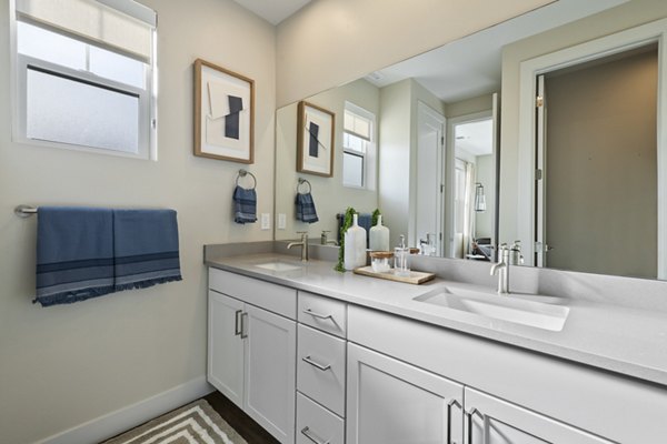 Spacious bathroom featuring modern fixtures at Viviano at Riverton Apartments