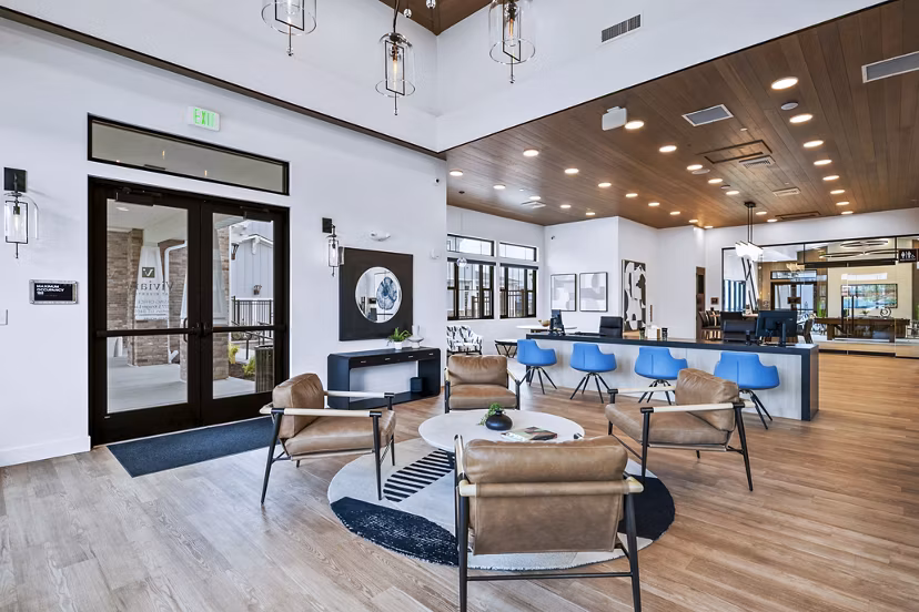 Clubhouse lounge area with modern decor at Viviano at Riverton Apartments