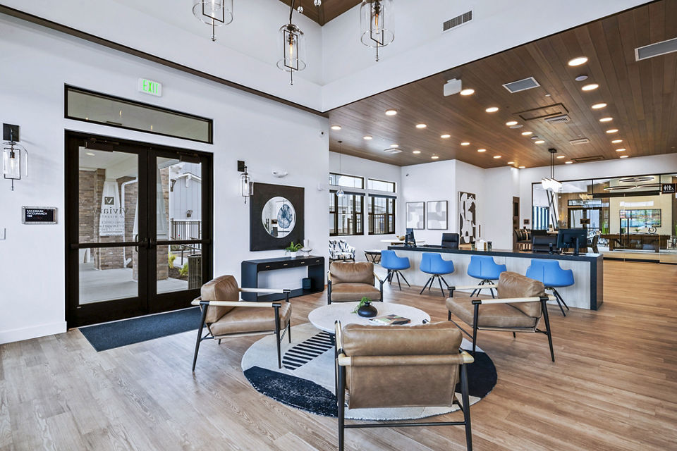 Clubhouse lounge area with modern decor at Viviano at Riverton Apartments