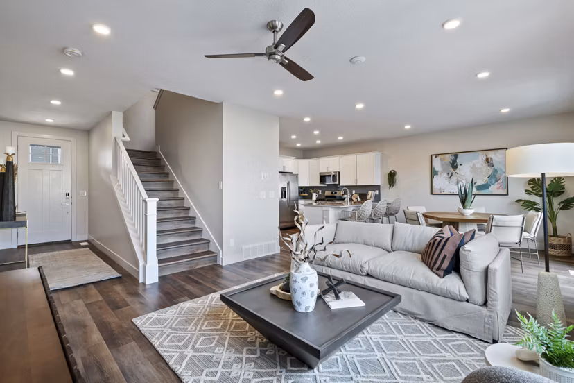 Modern living room with stylish furnishings at Viviano at Riverton Apartments luxury community