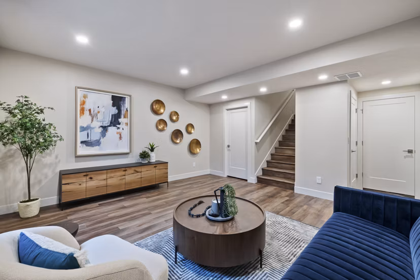 Modern living room with stylish decor in Viviano at Riverton Apartments