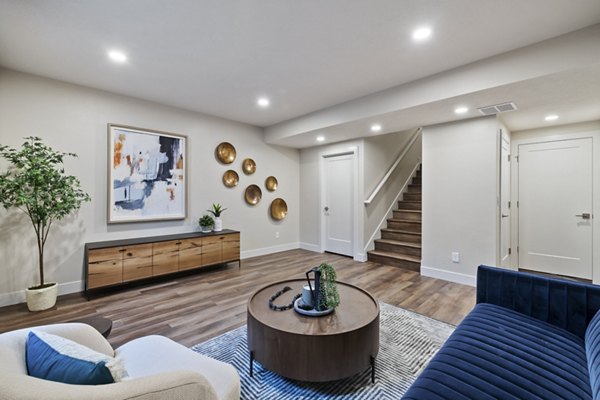 Modern living room with stylish decor in Viviano at Riverton Apartments