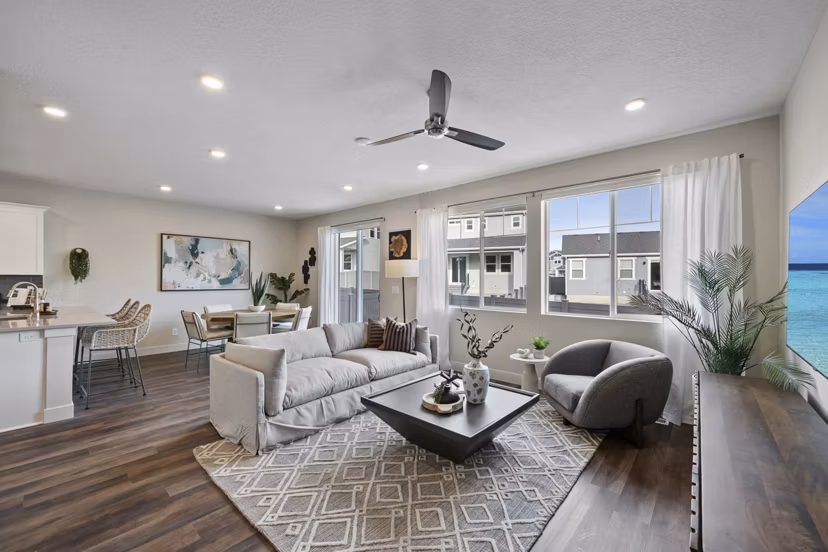 Spacious living room with modern furnishings at Viviano at Riverton Apartments