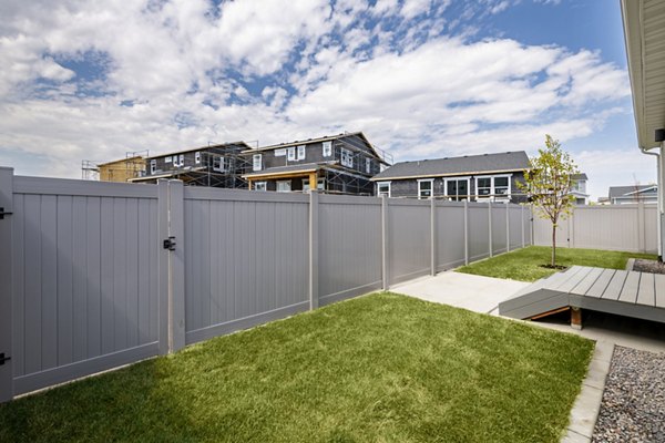 Chic outdoor patio with stylish seating at Viviano at Riverton Apartments