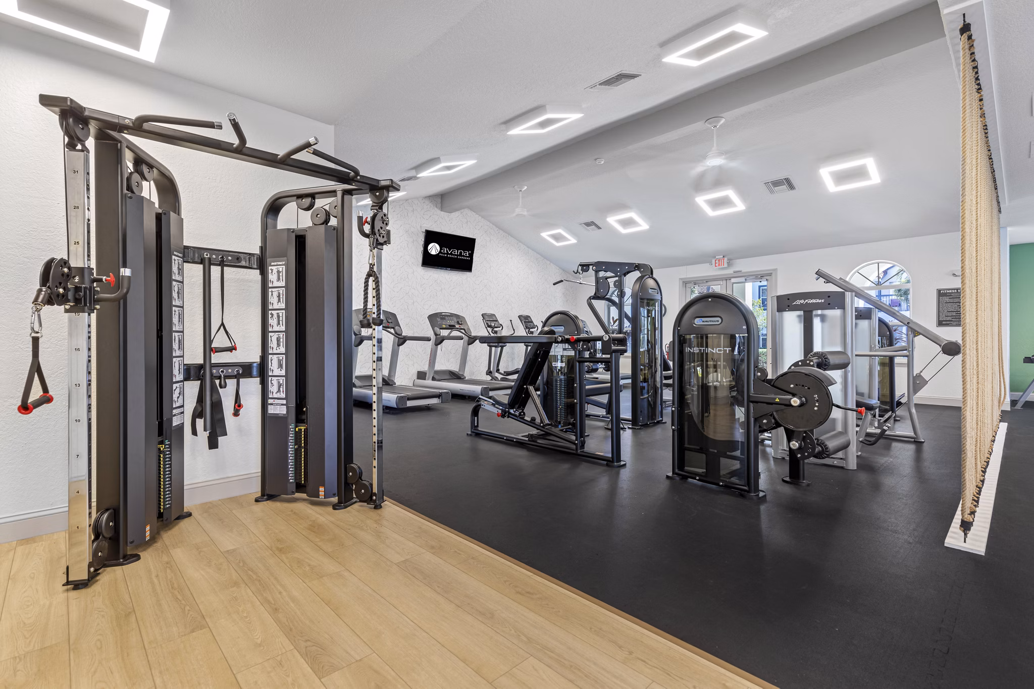 fitness center at Avana Palm Beach Gardens Apartments