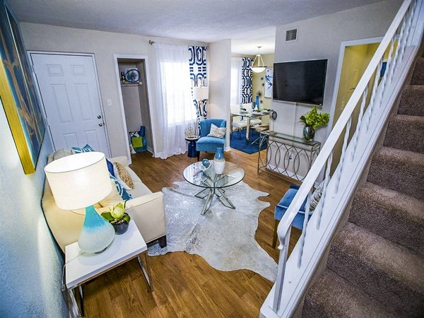 Spacious living room with stylish furnishings at The Laurels Apartments, luxury apartments by Greystar