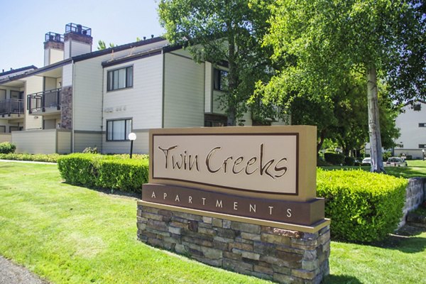 signage at Twin Creeks Apartments