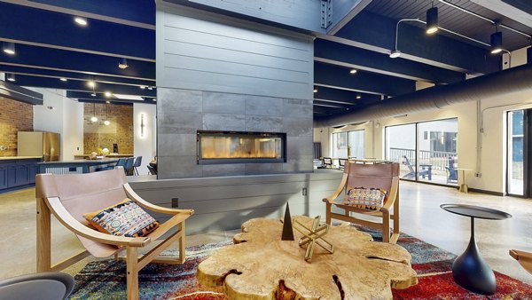 Modern clubhouse with plush seating and communal spaces at River Roost Apartments