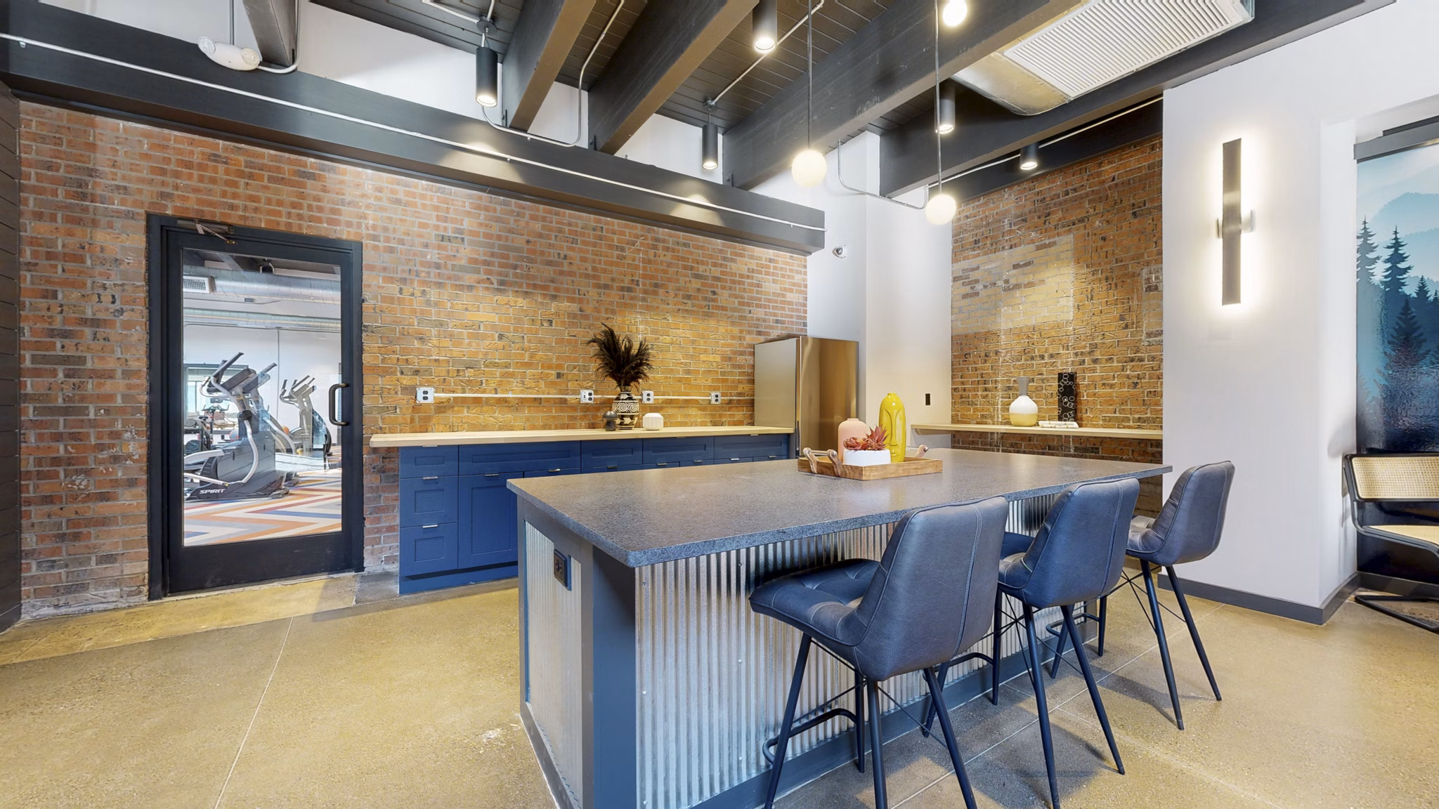 Clubhouse with modern decor and seating at River Roost Apartments, luxury living by the river