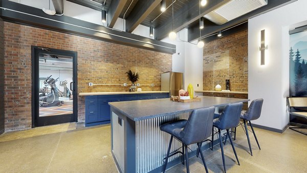 Clubhouse with modern decor and seating at River Roost Apartments, luxury living by the river