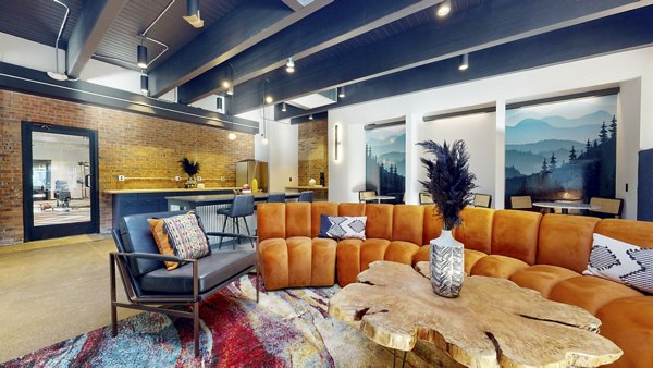 Clubhouse with modern design at River Roost Apartments, featuring comfortable seating and communal spaces for residents to relax and socialize