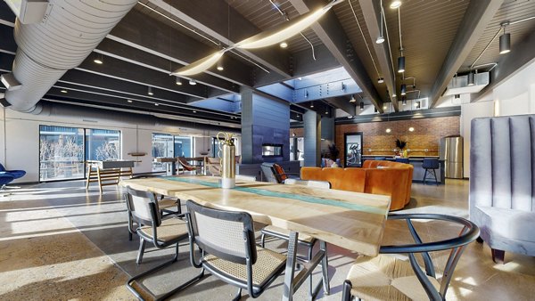 Elegant clubhouse with modern decor at River Roost Apartments offering luxury amenities and social spaces in a Greystar community