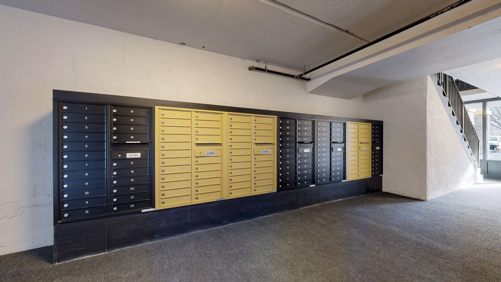 Mailroom equipped with individual parcel lockers at River Roost Apartments