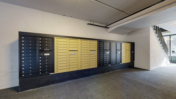 Mailroom equipped with individual parcel lockers at River Roost Apartments