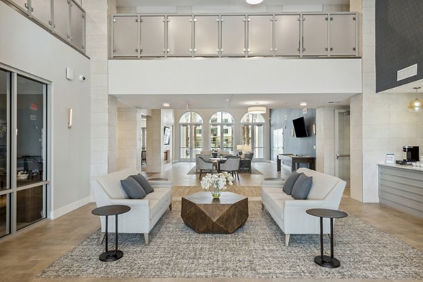 Clubhouse with modern interiors at Overture North Scottsdale Apartments, offering a luxurious setting for social gatherings and events