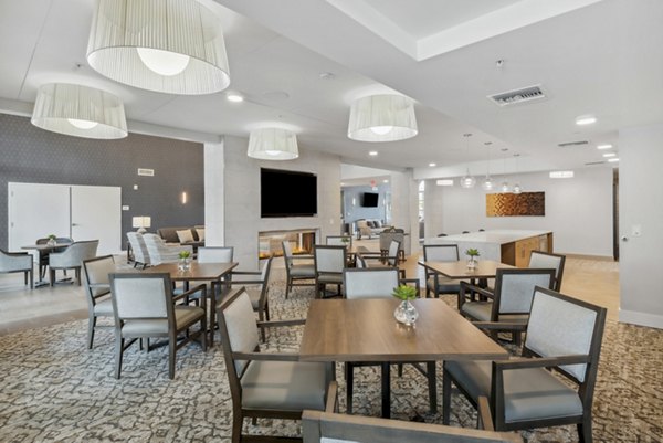 Clubhouse dining room with elegant dÃ©cor and ample seating at Overture North Scottsdale Apartments