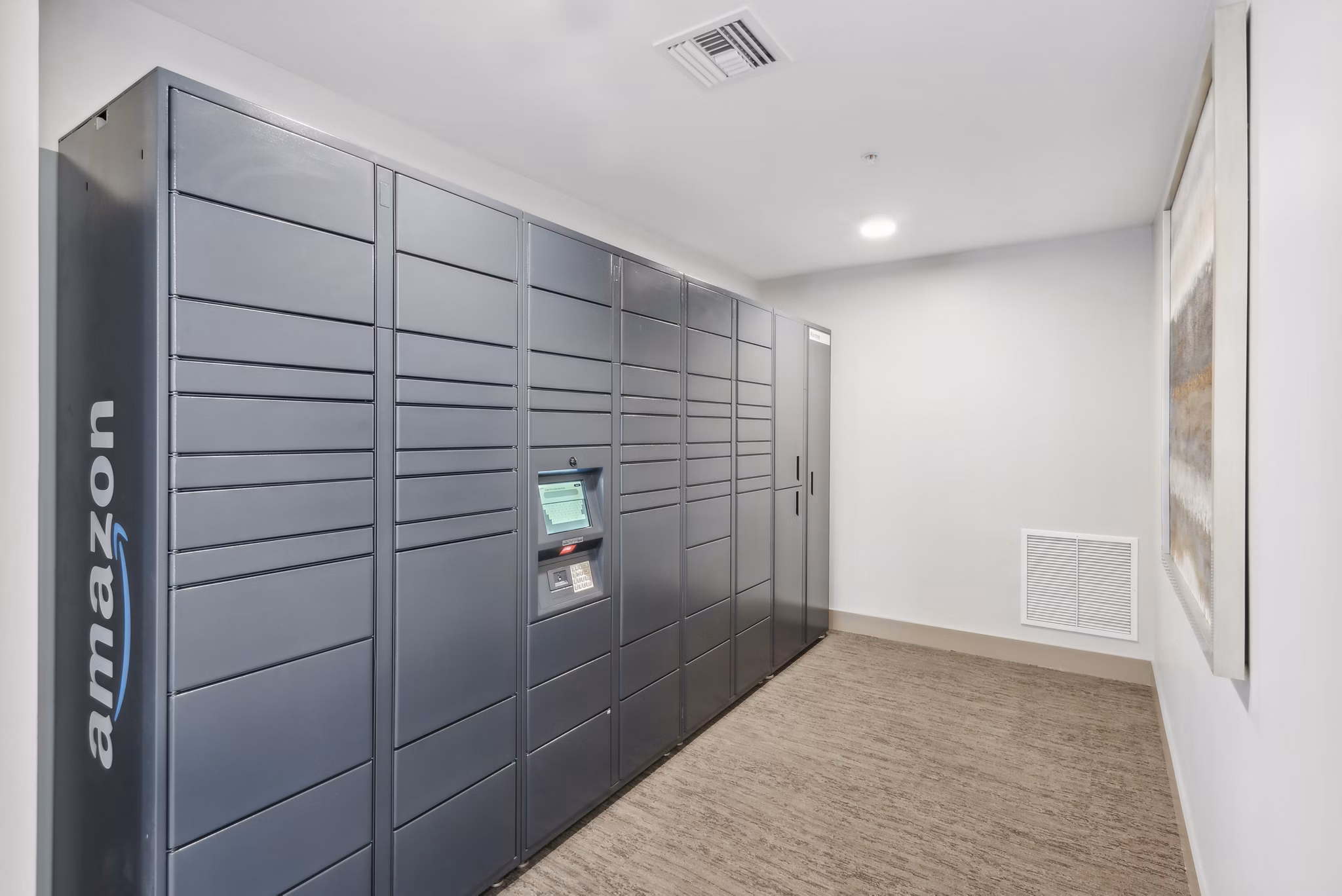 Parcel pickup locker at Overture North Scottsdale Apartments for secure and convenient package retrieval