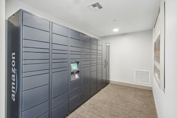 Parcel pickup locker at Overture North Scottsdale Apartments for secure and convenient package retrieval