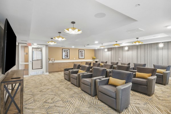 Clubhouse theater with comfortable seating at Overture North Scottsdale Apartments