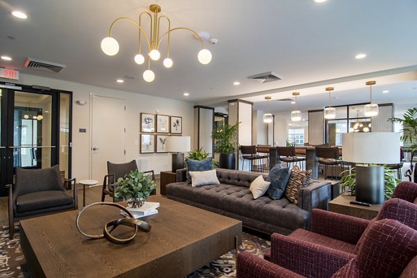 Elegant clubhouse featuring modern amenities at The Foundry at Mashburn Village Apartments